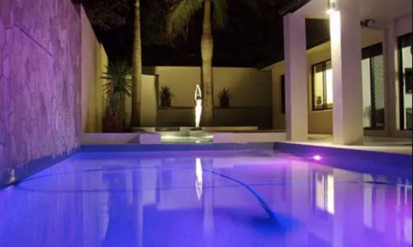 Large outdoor pool with LED pool lights installed